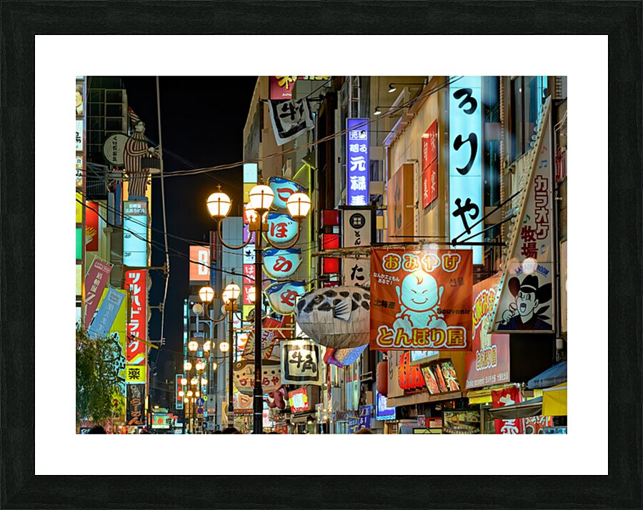 Illuminated signboards in Dotonbori District at sunset in Osaka Picture Frame print