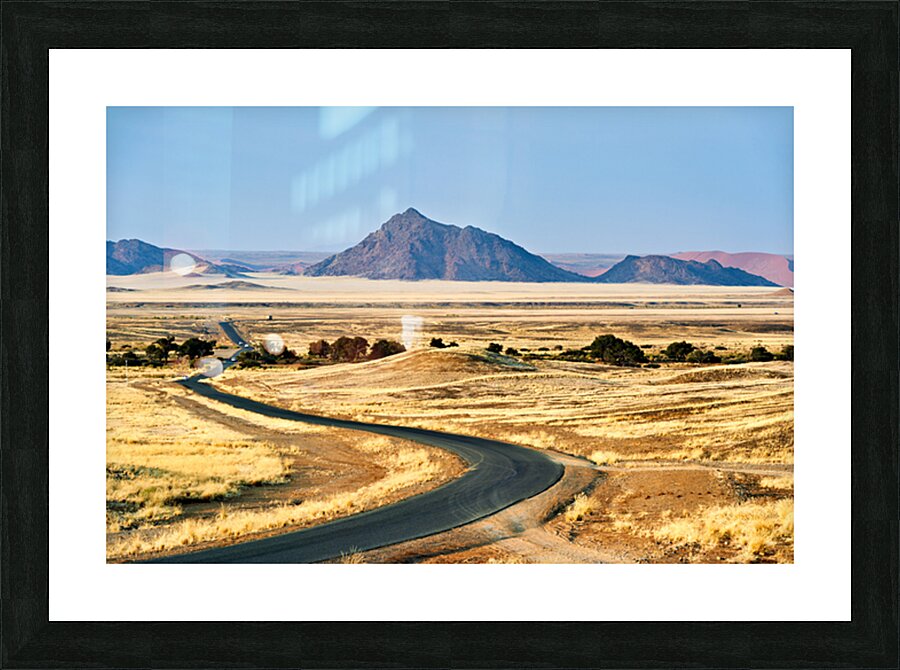 Driving through Namib Naukluft National Park towards Sossusvlei  Picture Frame print