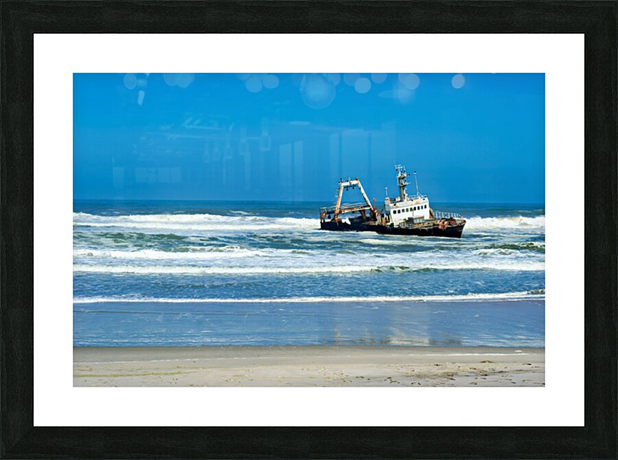 Shipwreck on the Skeleton Coast of Namibia under clear blue sky Picture Frame print