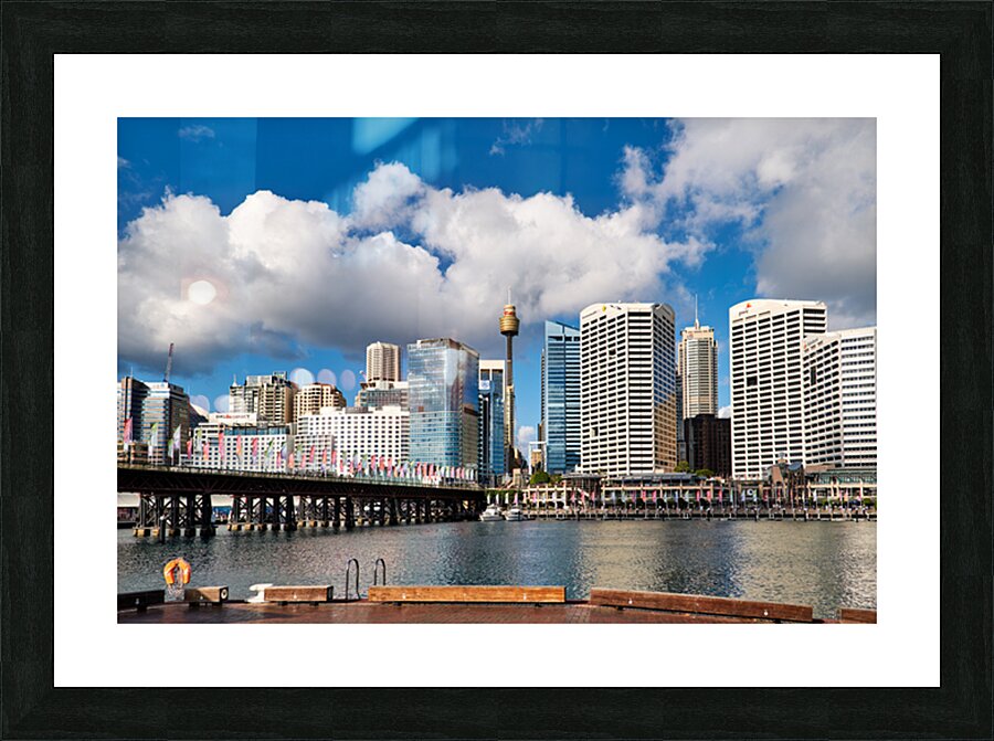 Sydney Harbour skyline with bridge and buildings under clouds. Picture Frame print