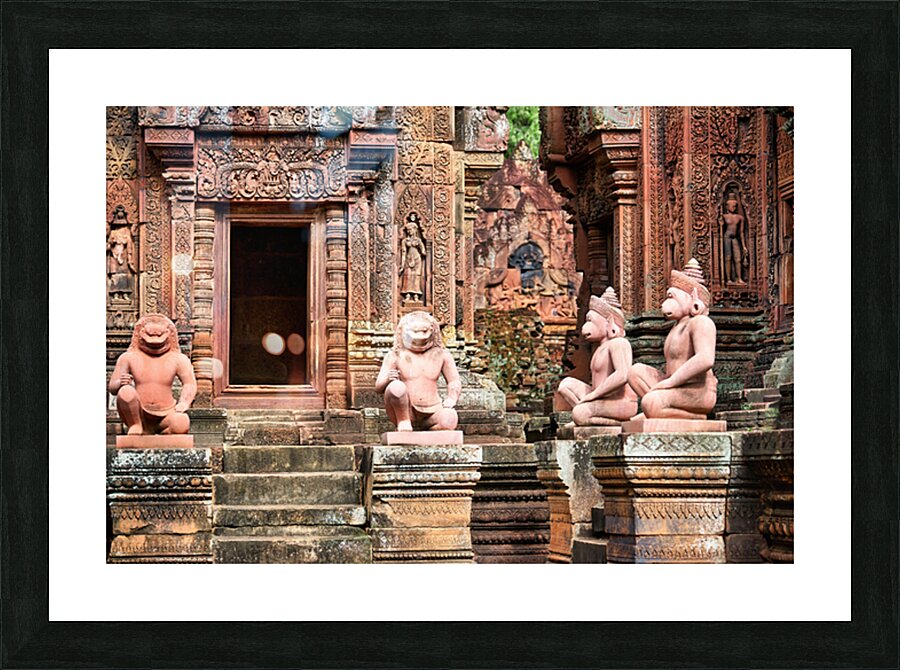 Ancient Cambodian temple with intricate red sandstone carvings a Picture Frame print