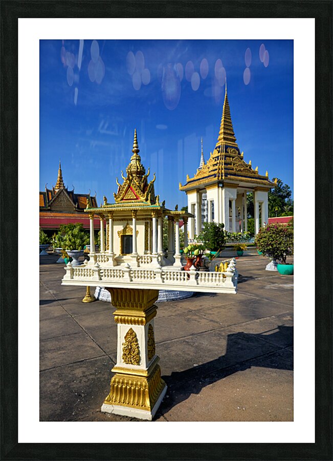 Golden shrine and temple buildings in Cambodia under blue sky. Picture Frame print