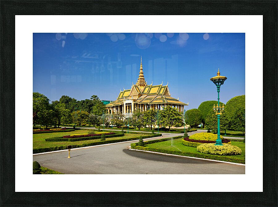 Golden roofed palace in lush gardens Phnom Penh Cambodia. Picture Frame print