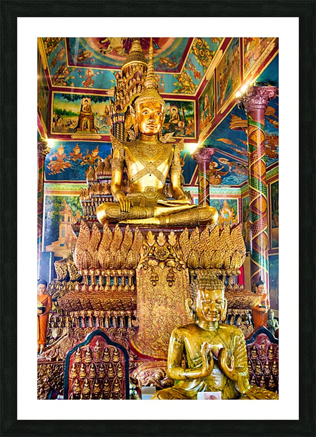Ornate golden Buddha statue in a richly decorated temple. Picture Frame print