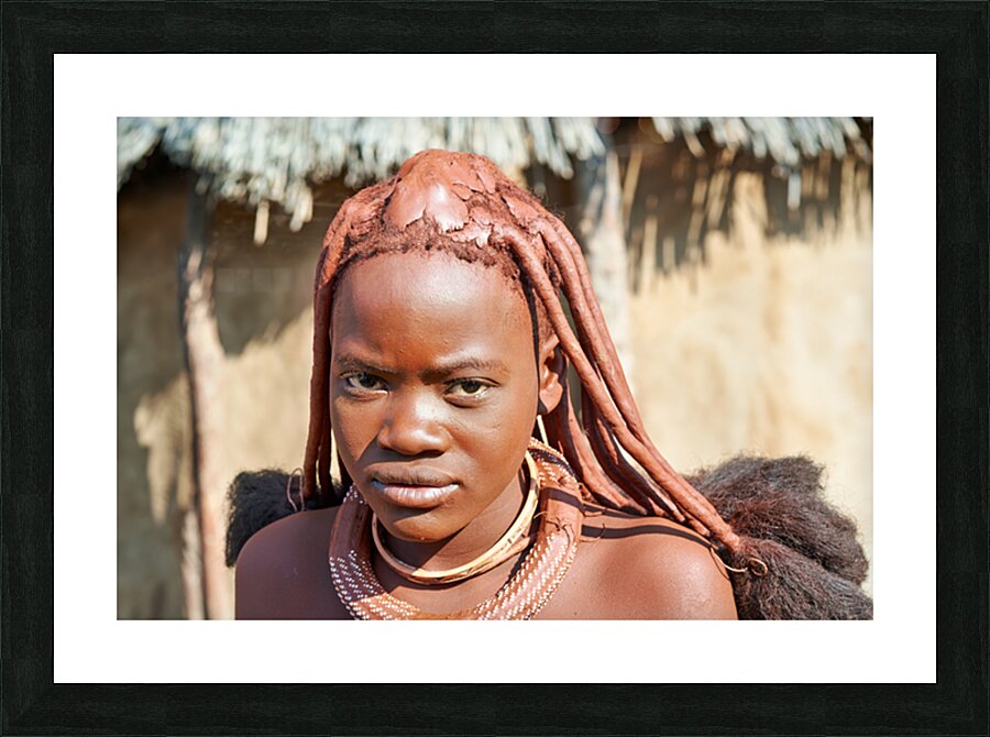 Himba woman in traditional hair headdress in Kunene Region of Na Picture Frame print