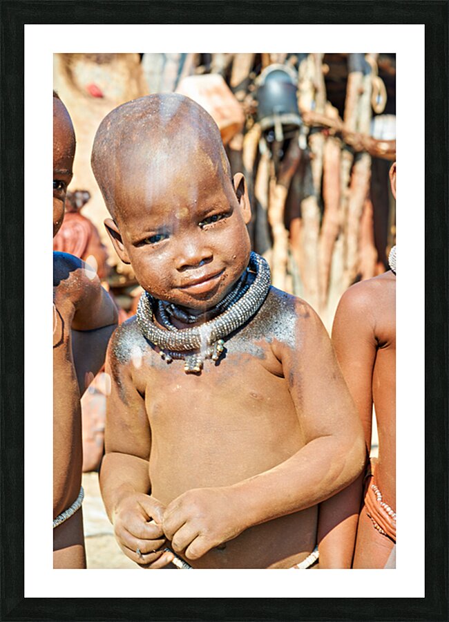 Portrait of child in Himba village in Kunene region of Namibia Picture Frame print