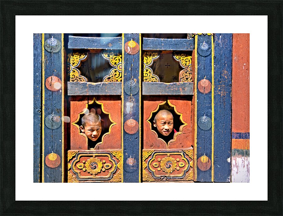 Young monks peeking from decorative colorful windows. Picture Frame print
