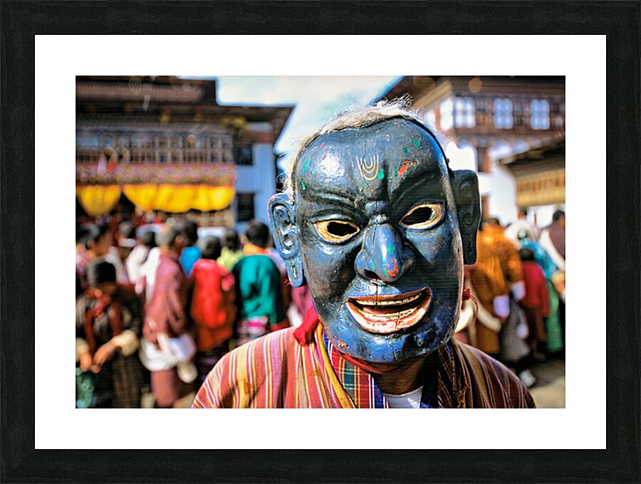 Traditional blue mask at a festival. Picture Frame print