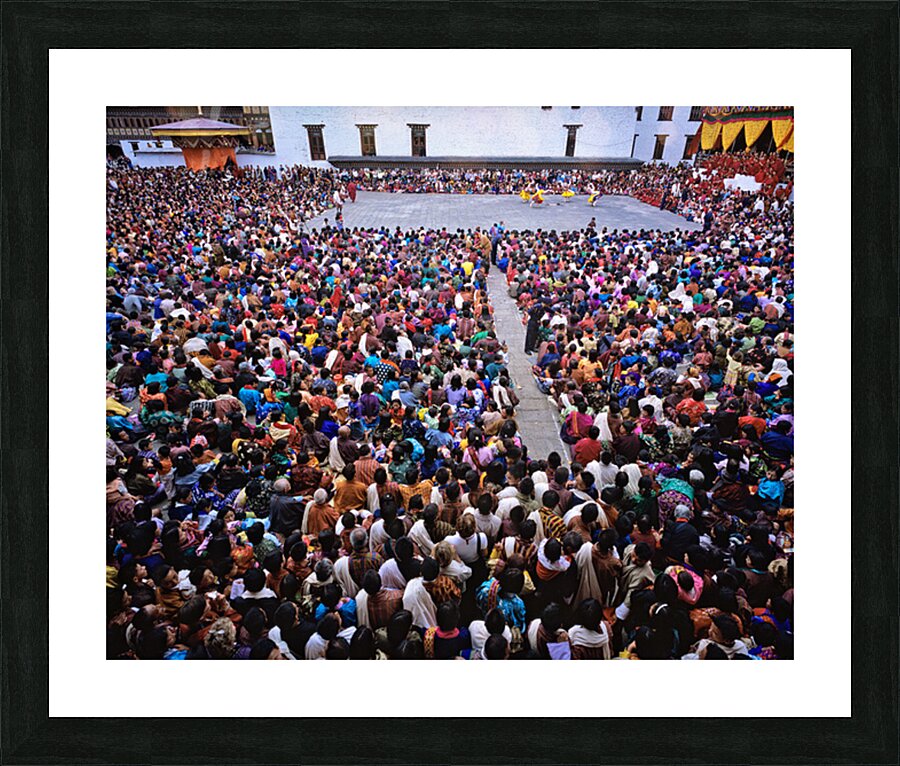 Large crowd watches traditional dance performance at outdoor fes Picture Frame print