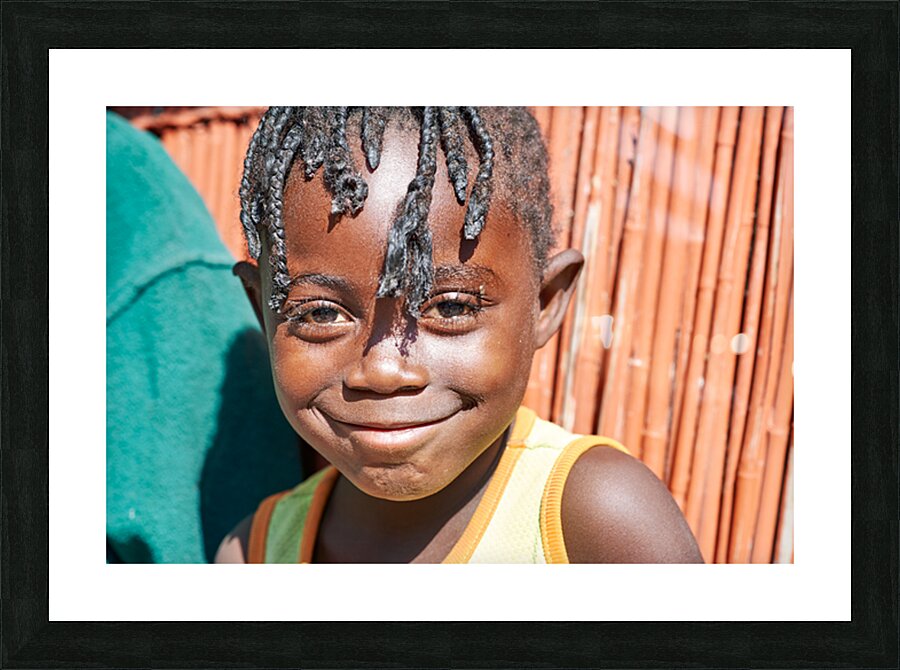 Joyful child smiles in Kavango Region of Namibia Picture Frame print