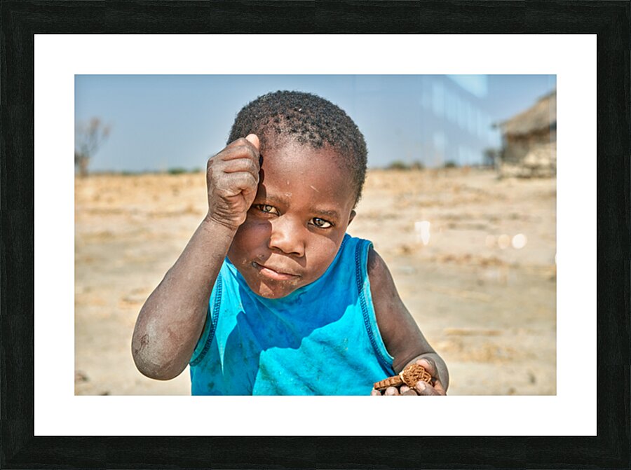 Joyful boy in Kavango Region playing in Namibia Picture Frame print