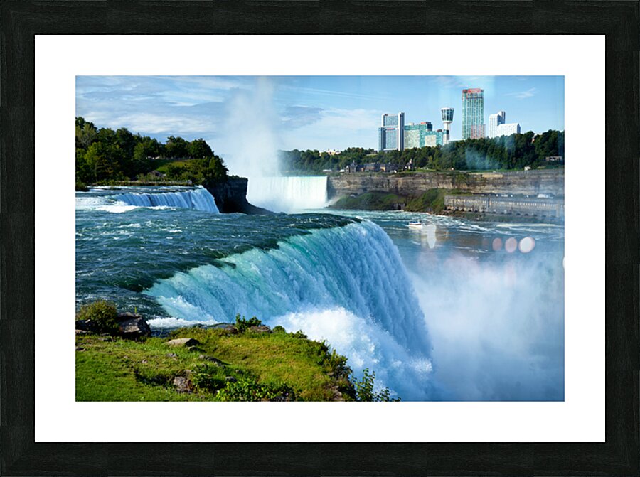 Niagara Falls with city skyline and boat. Picture Frame print