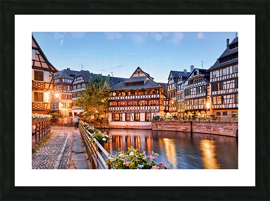 Evening in Petit France with timber framed houses by water Picture Frame print