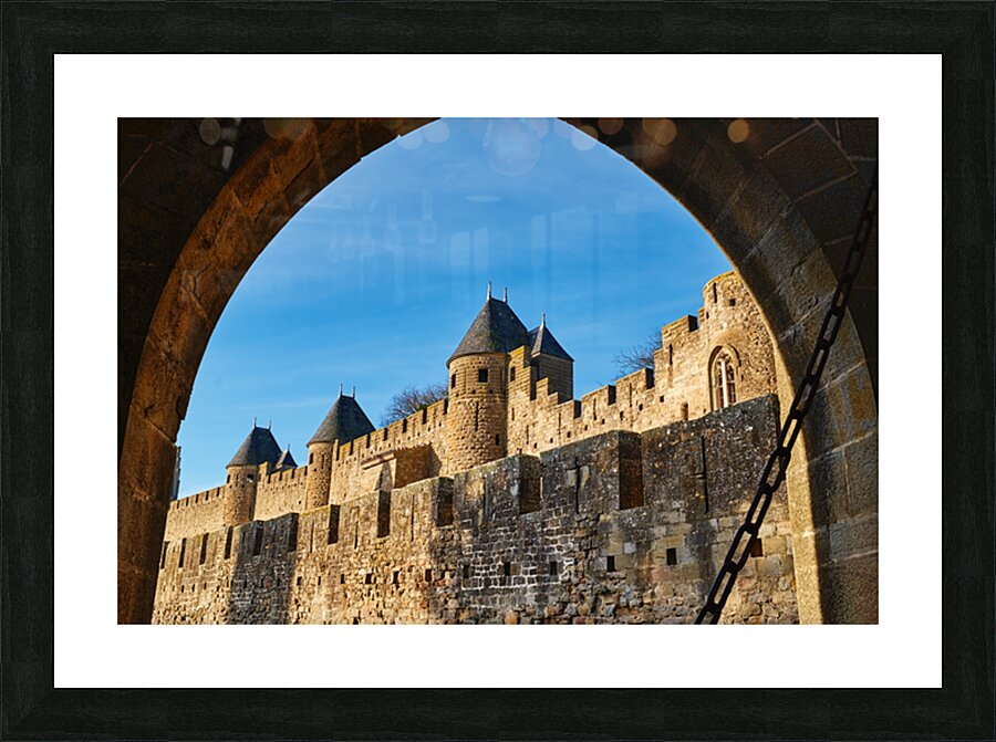 Exploring the historic walls of Carcassonne in France under blue Picture Frame print