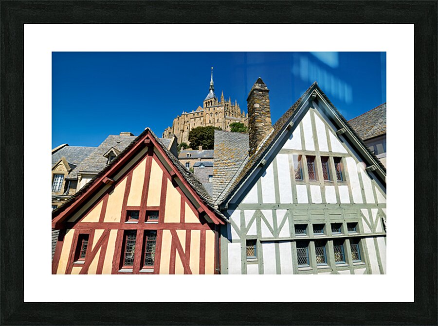 Visit Mont Saint Michel in Normandy France under clear blue sky Picture Frame print