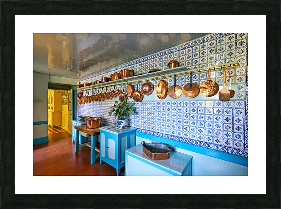 Explore the kitchen in Monets house at Giverny in Normandy Fran Picture Frame print