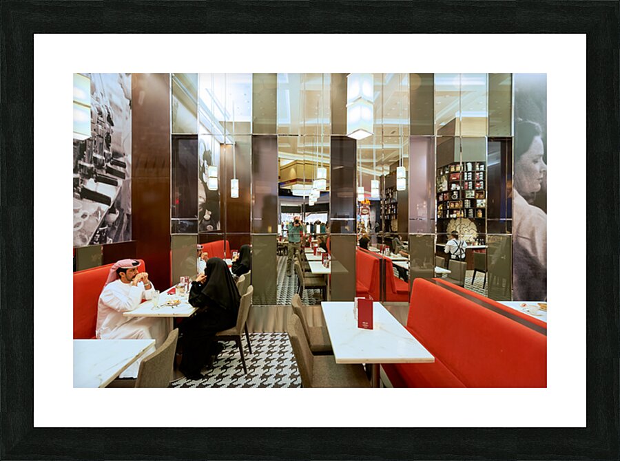 Dining in a modern restaurant with reflective walls in Dubai Picture Frame print