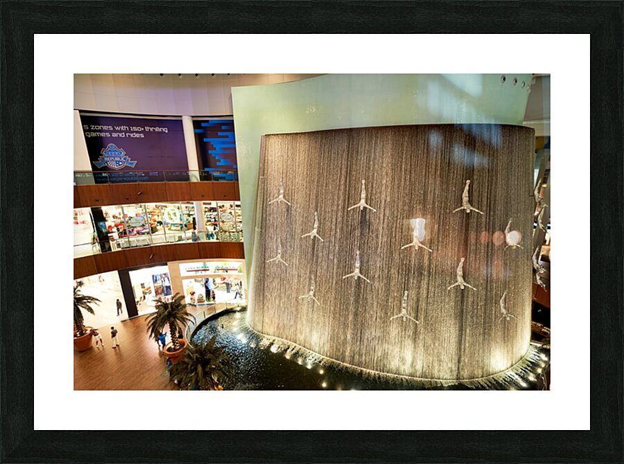 Indoor waterfall with diver sculptures in a mall in Dubai UAE Picture Frame print