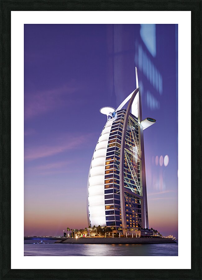 Burj Al Arab hotel illuminated at dusk in Dubai UAE Picture Frame print