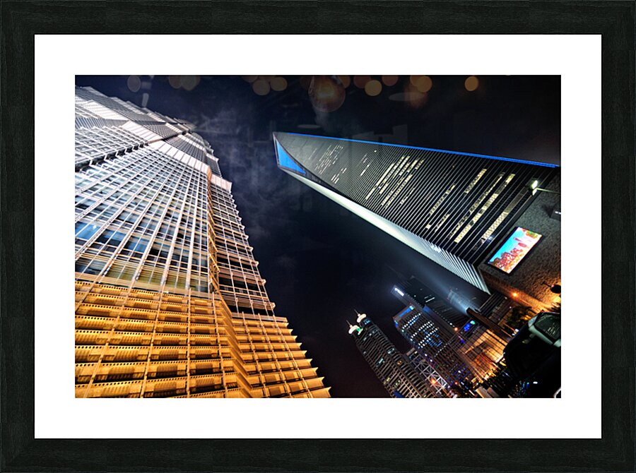 City skyline with skyscrapers shining bright in Shanghai at nigh Picture Frame print