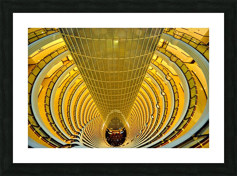 Golden hotel atrium with glass elevator in Shanghai China Picture Frame print