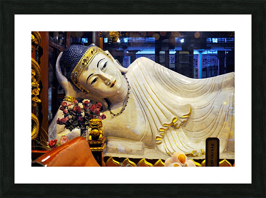 Reclining Buddha statue in Shanghai temple with flowers and gold Picture Frame print
