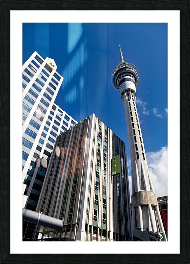 Sky Tower in Auckland showing city buildings and clear sky Picture Frame print
