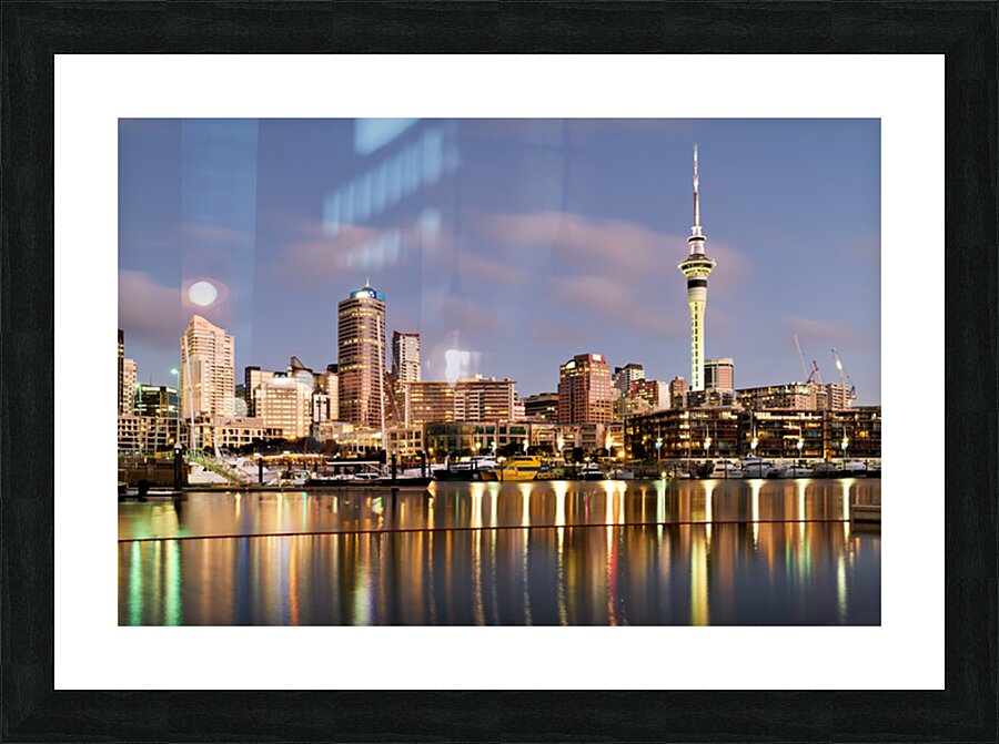 Auckland skyline with buildings and Sky Tower during evening Picture Frame print