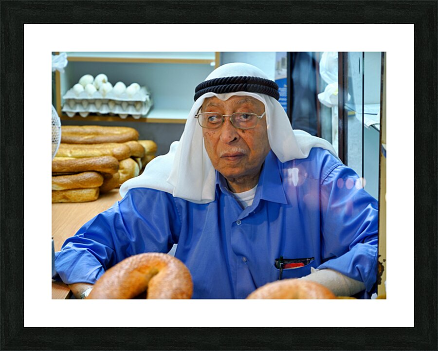 Baker working in the souq of the old city in Jerusalem Israel Picture Frame print