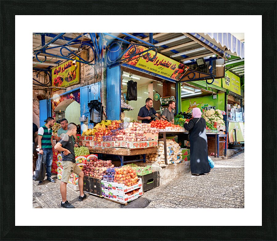 Greengrocer stall in the old city of Jerusalem busy with shopper Picture Frame print