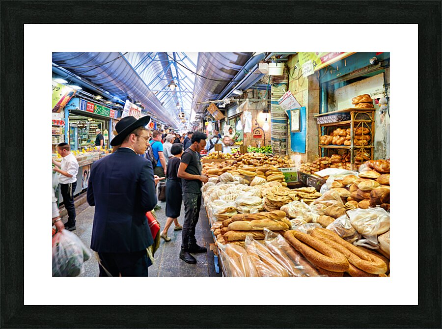 Visitors explore Mahane Yehuda Market in Jerusalem during daytim Picture Frame print