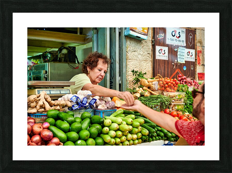 Local vendor sells fresh produce in Mahane Yehuda Market Picture Frame print
