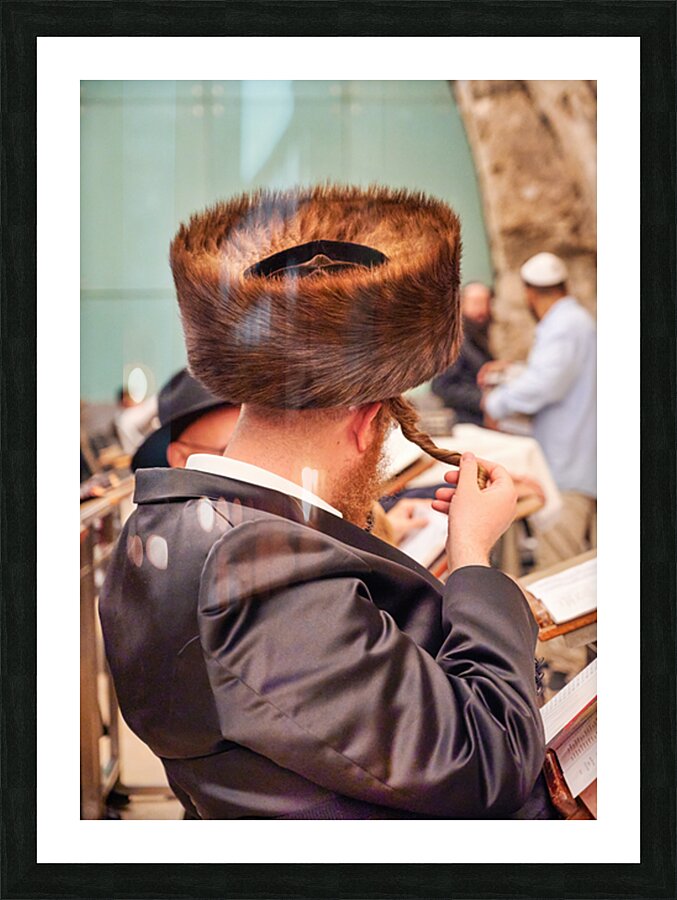 Orthodox Jews pray and read at the Wailing Wall in Jerusalem Picture Frame print