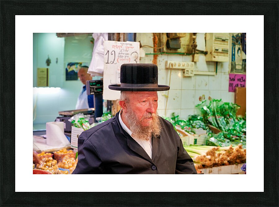 Elderly man in Mahane Yehuda Market in Jerusalem during a busy d Picture Frame print