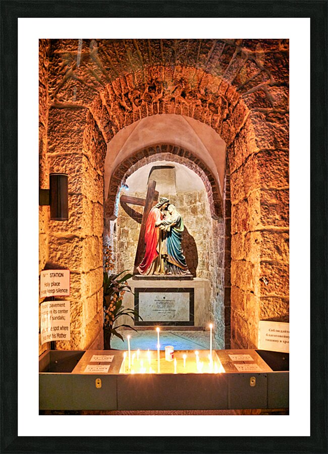 Statue of Mary and Jesus in a chapel with candles Picture Frame print
