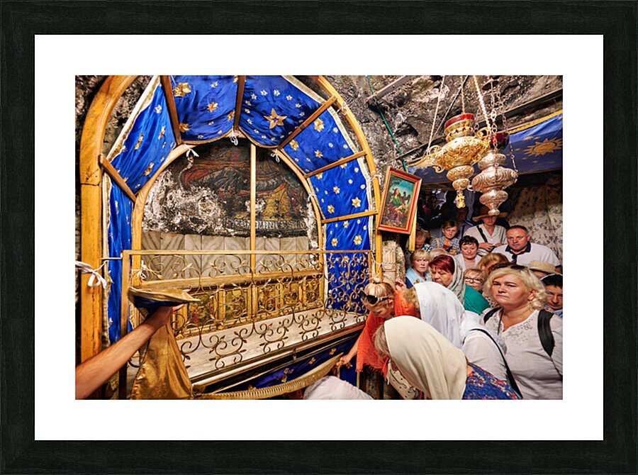Visiting grotto of nativity in Bethlehem Jerusalem during the d Picture Frame print