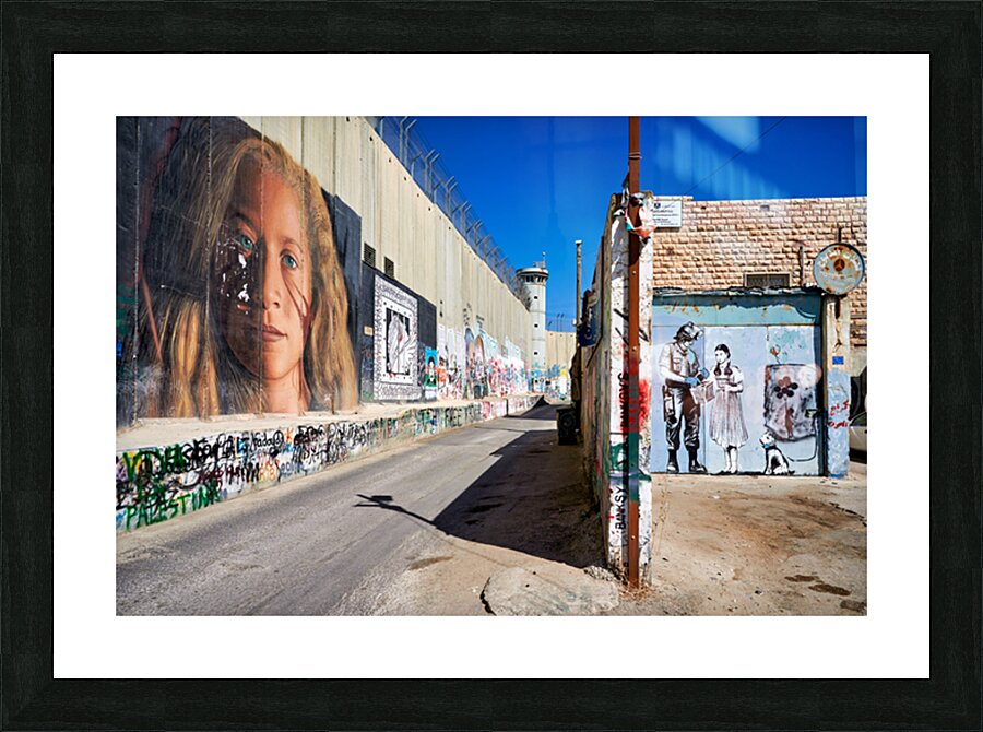 West Bank separation wall in Bethlehem shows murals and artwork Picture Frame print