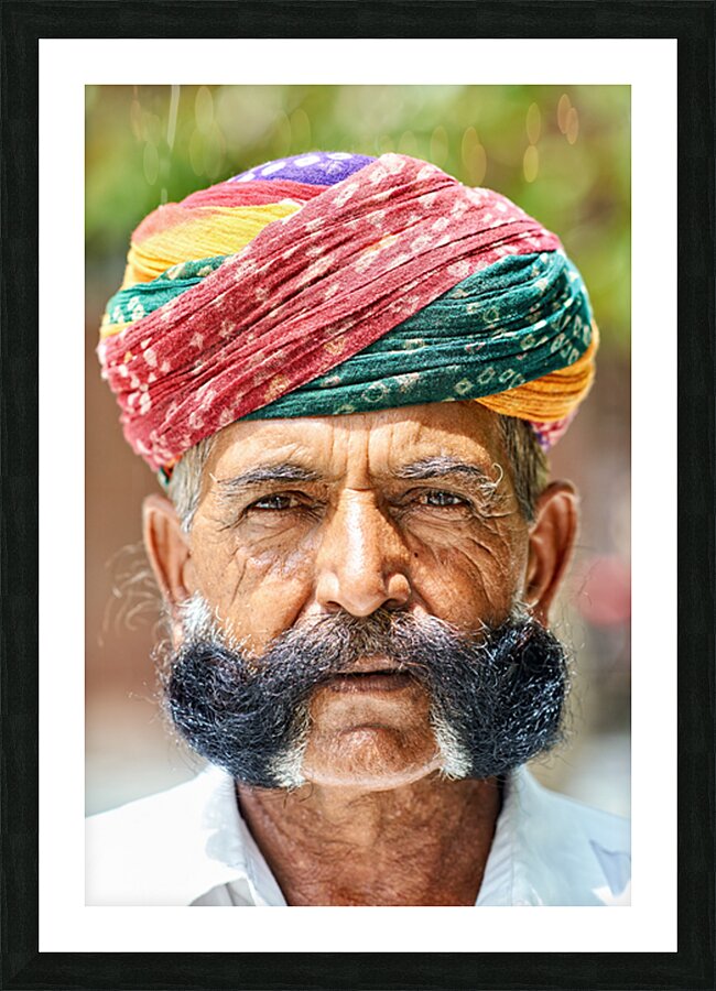 Senior man in colorful turban in Deshnok Rajasthan India Picture Frame print