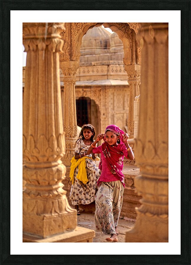 Girls playing in Jaisalmer Rajasthan during the evening light Picture Frame print