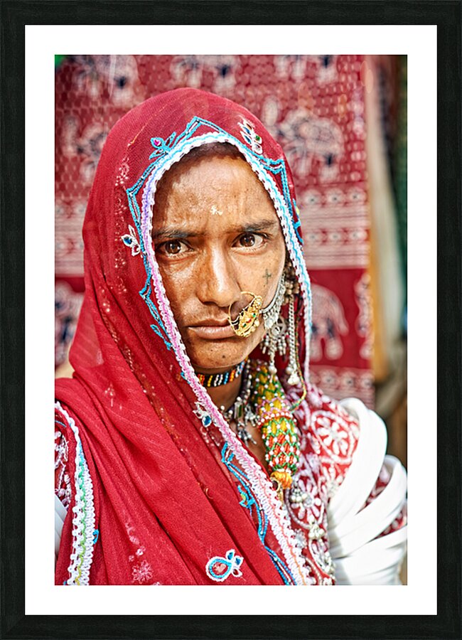 Portrait of a woman in traditional dress from Jaisalmer India Picture Frame print