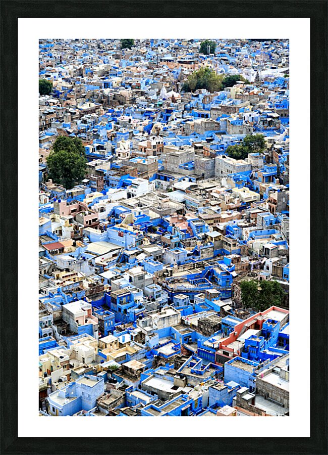 Cityscape of blue houses in Jodhpur Rajasthan during the aftern Picture Frame print