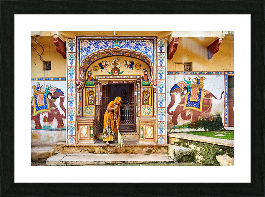 Bundi Rajasthan house with painted walls and a woman sweeping Picture Frame print