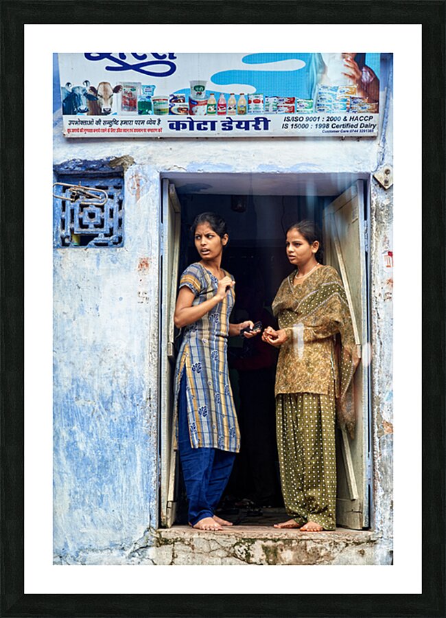 Women stand at their house door in Bundi Rajasthan Picture Frame print