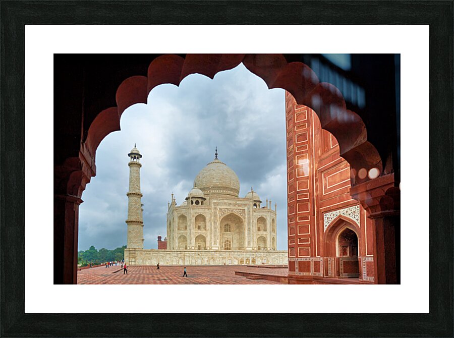 View of the Taj Mahal from an archway in Agra India Picture Frame print
