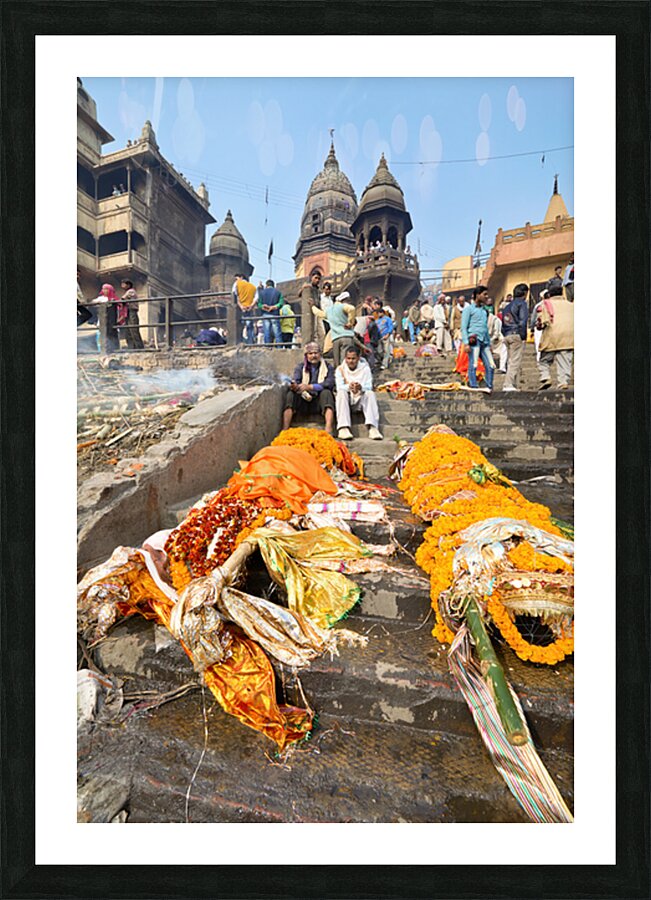 Cremation rites along the river Ganges in Varanasi India Picture Frame print