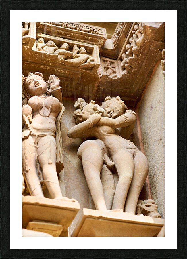 Hindu temples in Khajuraho display intricate erotic carvings Picture Frame print