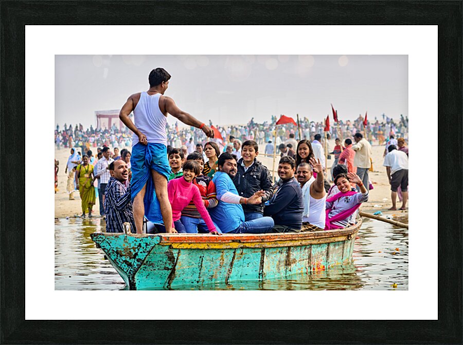 People sit on a boat on the Ganges River Picture Frame print
