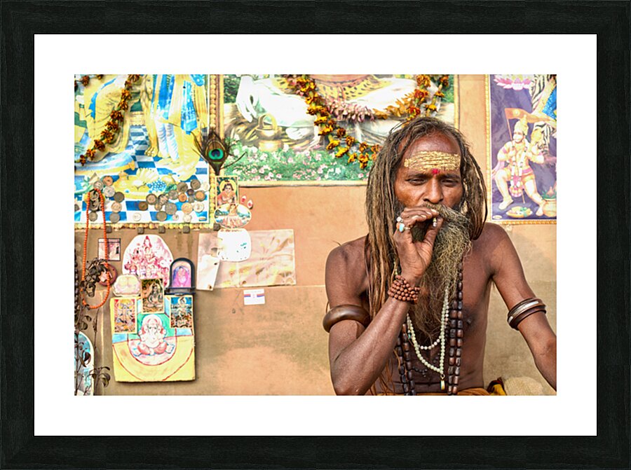 Holy man sadhu in Varanasi Uttar Pradesh sharing wisdom Picture Frame print