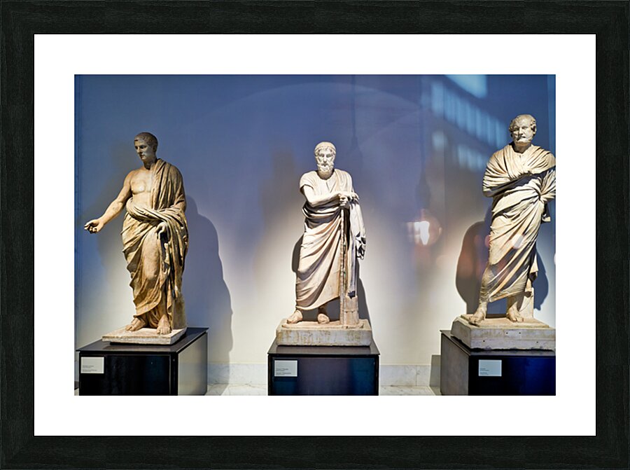Statues of ancient philosophers displayed in museum setting Picture Frame print