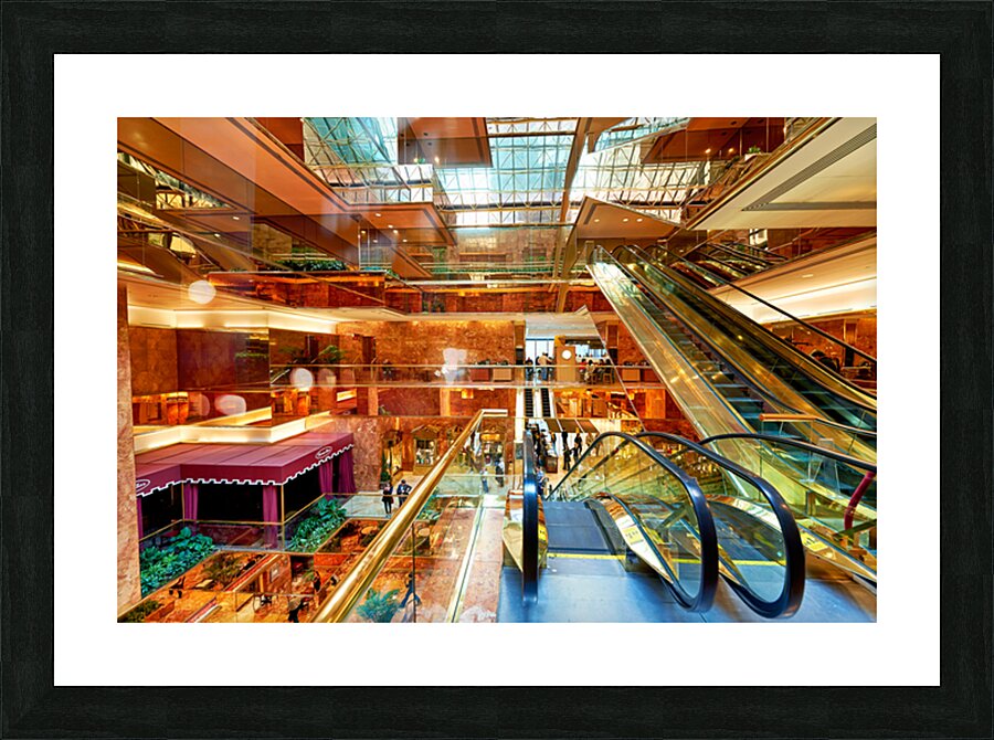 Visitors explore the Trump Tower atrium in Manhattan New York Picture Frame print
